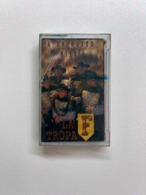 La Tropa F A Un Nuevo Nivel Cassette Tape 1996 EMI Latin Tejano Tex-Mex RMS